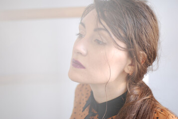 A serious woman with drama make up
