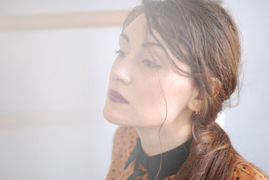 A serious woman with drama make up
