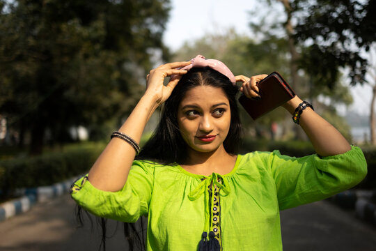 Portrait of a young Indian woman at outdoors
