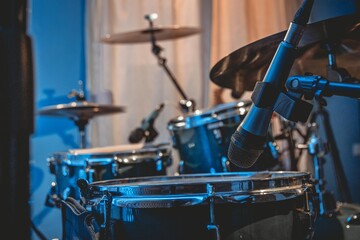 Fototapeta na wymiar Blue drum with mics in studio