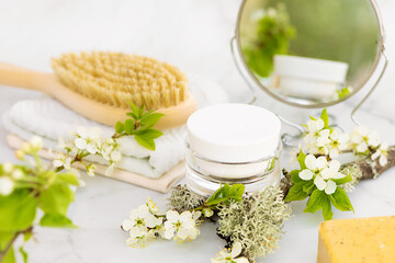 bathroom accessories, natural cosmetic product, moisturizing cream, herbal mask, brush for dry massage, anti cellulite, stretch marks, wrinkles, for face skin renewal and care on marble background