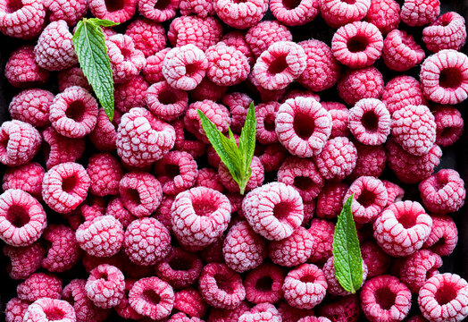 Frozen raspberries - Powered by Adobe