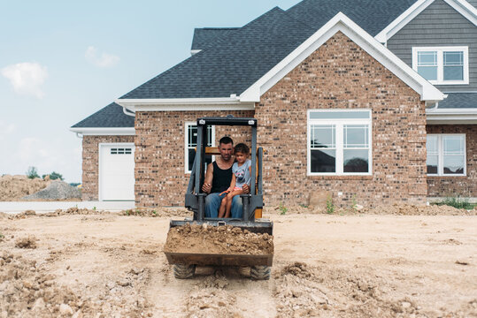 Moving dirt in the front yard. 