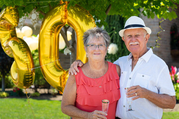 Senior Citizen Couple Portrait at Golden 50th Wedding Anniversary