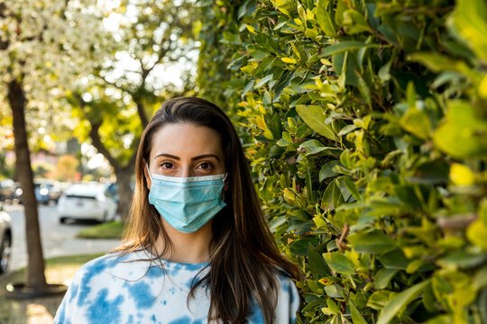 Woman Wears A Mask Outdoors 