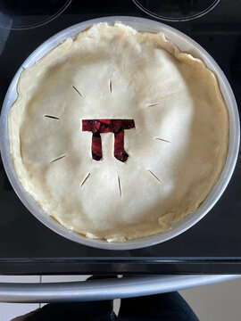 pie with a pi symbol carved into it