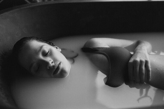 Woman relaxing in a bath
