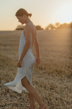 Woman in camisole dress in the nature