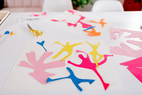 Table with colorful construction paper