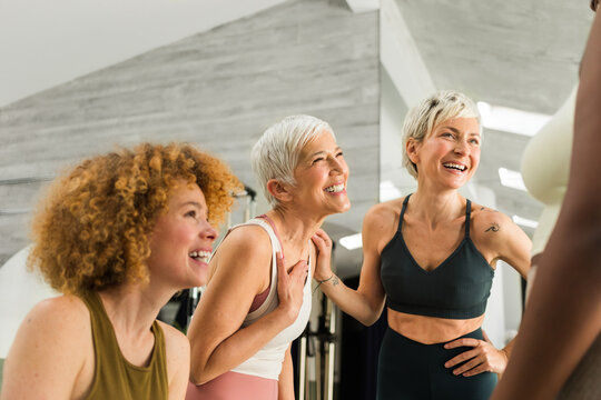 Group of Sportswomen in Pilates Studio 
