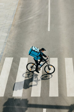 Delivery Woman on Bicycle 