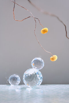 Arranged yellow flowers and sparkling crystals
