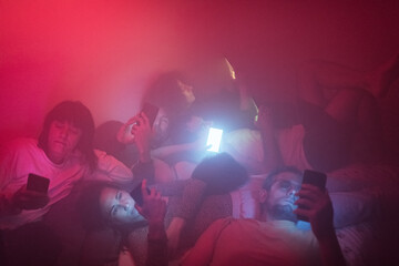 Friends using their smartphones