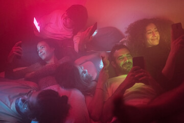 Friends connecting with their phones