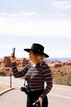 Girl with phone in Utah