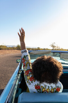 African American Woman on Road Trip Driving Car 