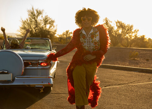 Fashion Shoot with black  model with Swagger  and  Vintage car