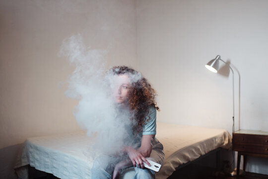 Young woman tired of using internet 