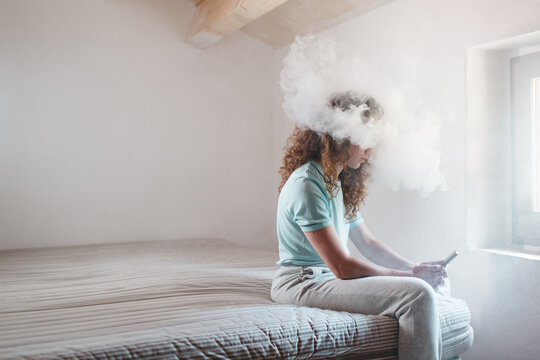 Woman with a smoke cloud around her head