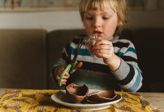A child with chocolate easter egg