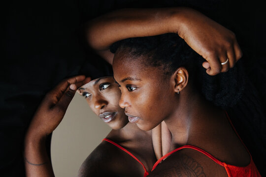 Black girl reflected in the mirror