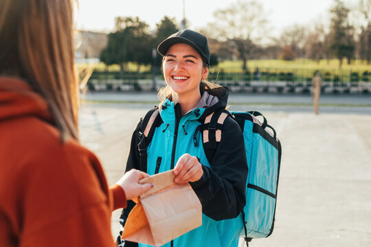 Delivery Girl Delivering Food to Customer 