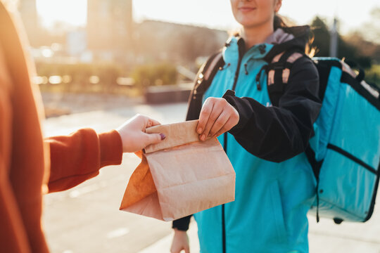 Delivery Girl Delivering Food to Customer 