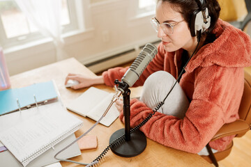 young woman getting ready to podcast