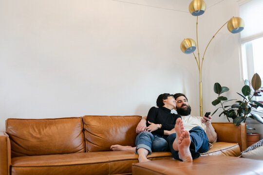 Couple Browsing TV Channels