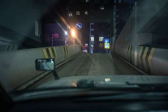 Point of view of a driver exiting an underground parking 