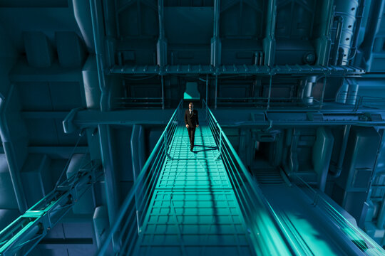 Man walking across aerial footpath