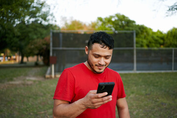latino with phone