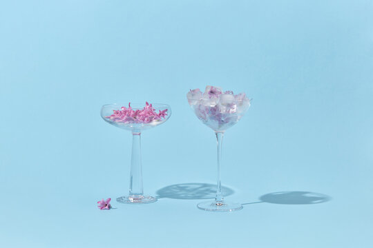 Flowers and ice cubes in glasses