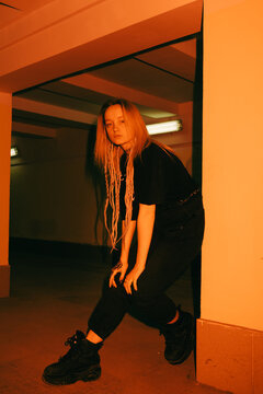 Young  woman flashed with red light