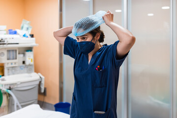 Surgeon preparing the operating room to operate