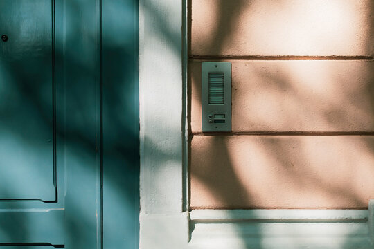 shadows and colors with very contrasting natural light on colorful urban facade