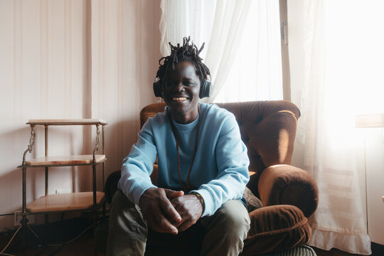 smiling man enjoying the music