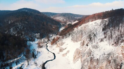 Winter view in the valley of the Ojcowski Park Narodowy in Krakow, Poland. Limestone rocks with...