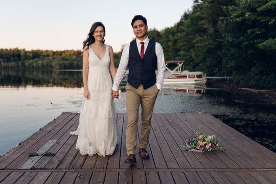 bride and groom at sunset but he lake 