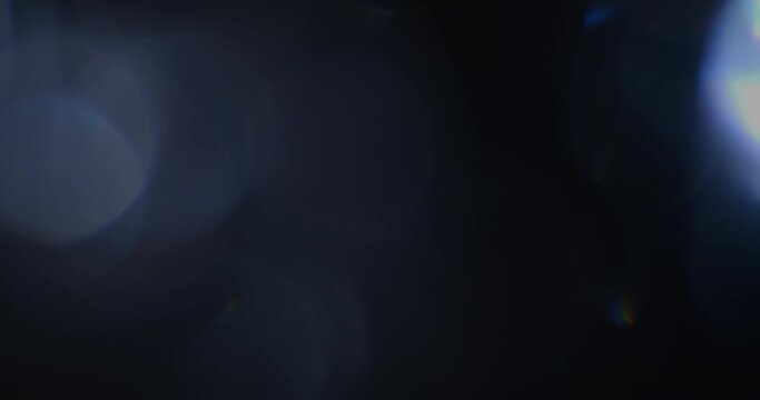 Seamlessly looped big moving colorful bokeh lights shot with a vintage cinema lens for use as an overlay in any NLE