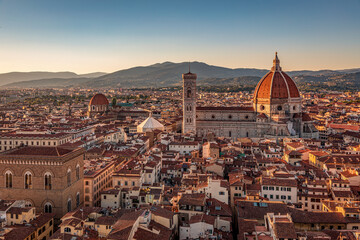 Fototapeta na wymiar Florence, Italy - 20 June, 2019 : view of Cathedral of Santa Maria del Fiore, known for its red-tiled dome, overview from Arnolfo Tower (Torre di Arnolfo) - 95m-tall medieval tower.