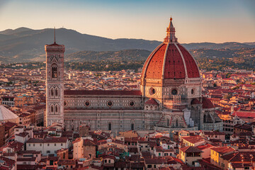 Obraz premium Florence, Italy - 20 June, 2019 : view of Cathedral of Santa Maria del Fiore, known for its red-tiled dome, overview from Arnolfo Tower (Torre di Arnolfo) - 95m-tall medieval tower.