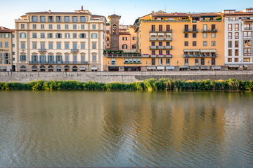 Fototapeta na wymiar Florence, Italy -20 June, 2019 : view of residential area of the city at the bank of River Arno.
