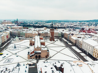 Aerial view of the Town hall tower in the old square of Krakow. Poland. City with ancient...