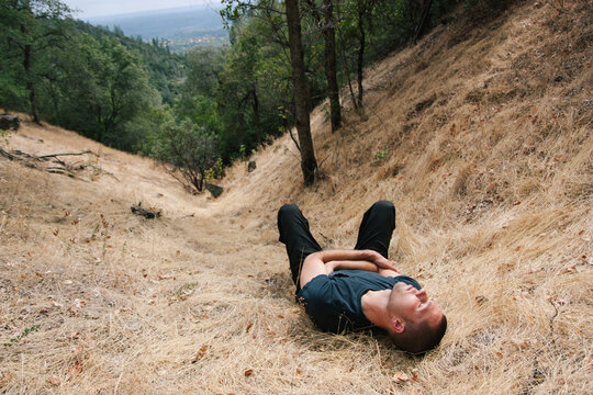 Man Resting in Dry California Landscape