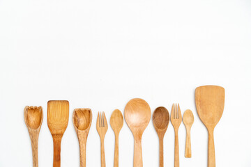 wooden kitchen utensils on white background