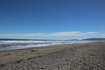 Pacific Ocean beach, Chiloe Island, Chile.