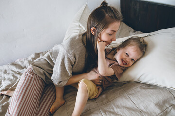 Mother and child in bedroom