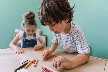 Joyful Children Drawing Colorful Rainbow