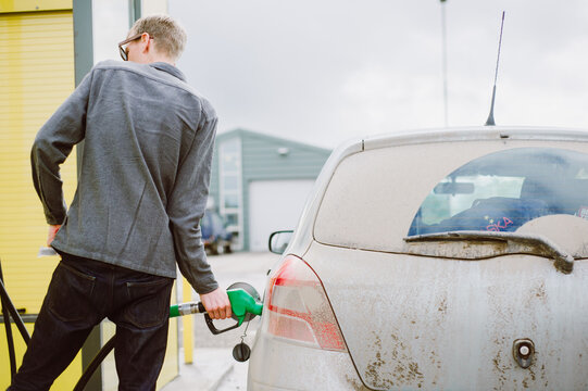 Man Pumping Gas